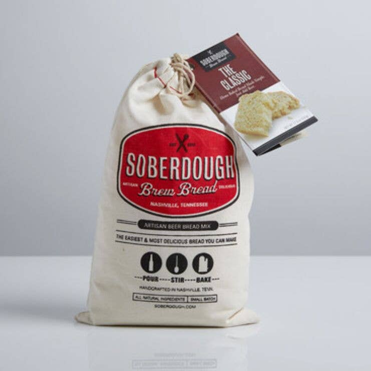 Bag of Soberdough Brew Bread with a smaller packaging on a light gray background