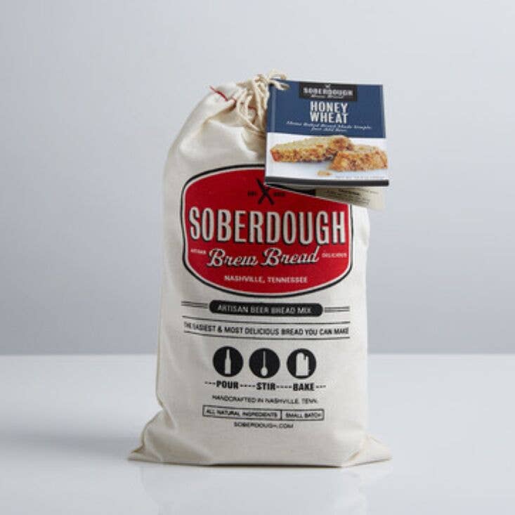Bag of Soberdough Brew Bread with a tag on a white background