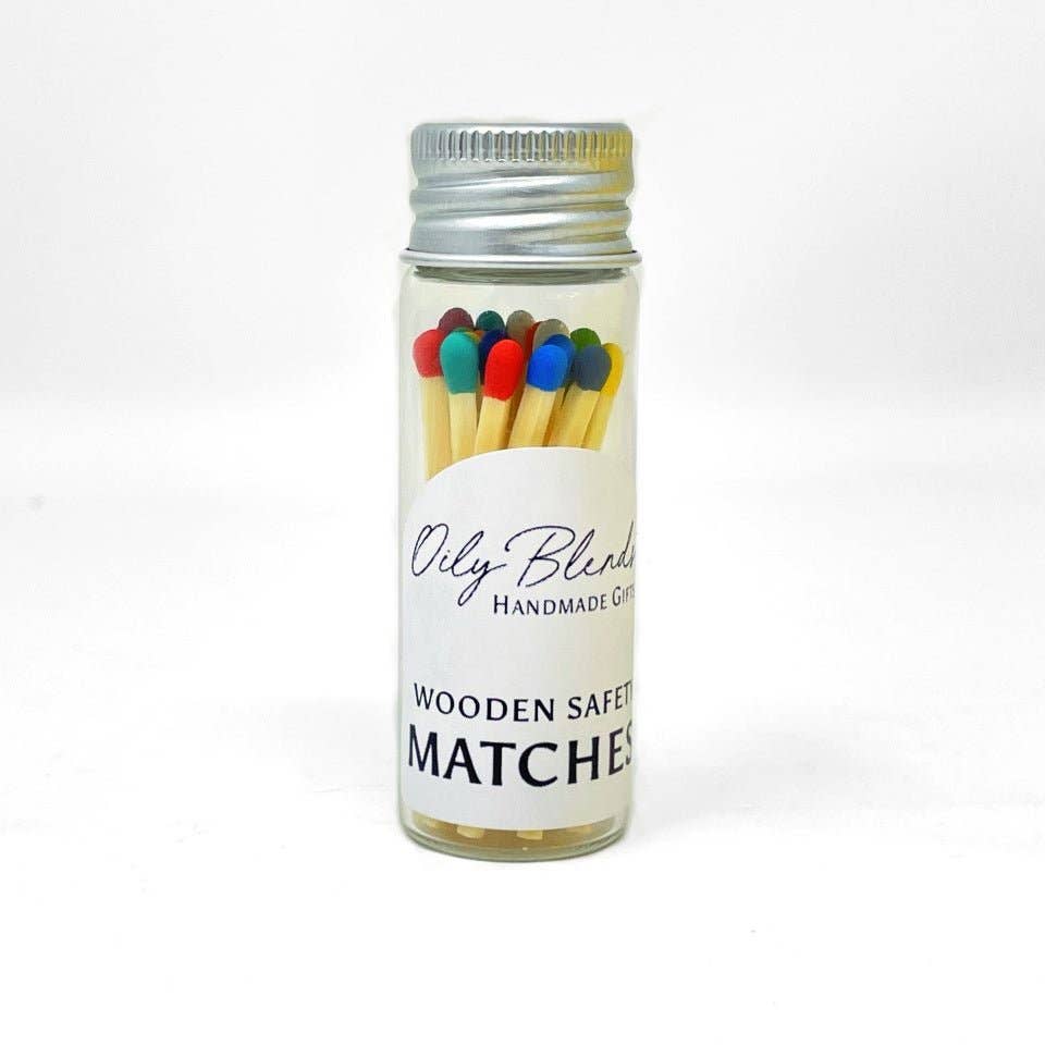 Jar of colorful matches with a visible brand label on a white background